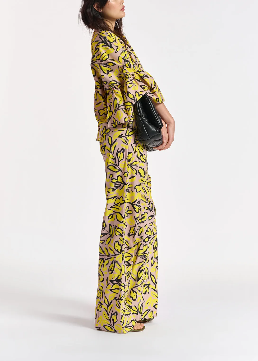 Beige floral printed top with ruffled sleeves