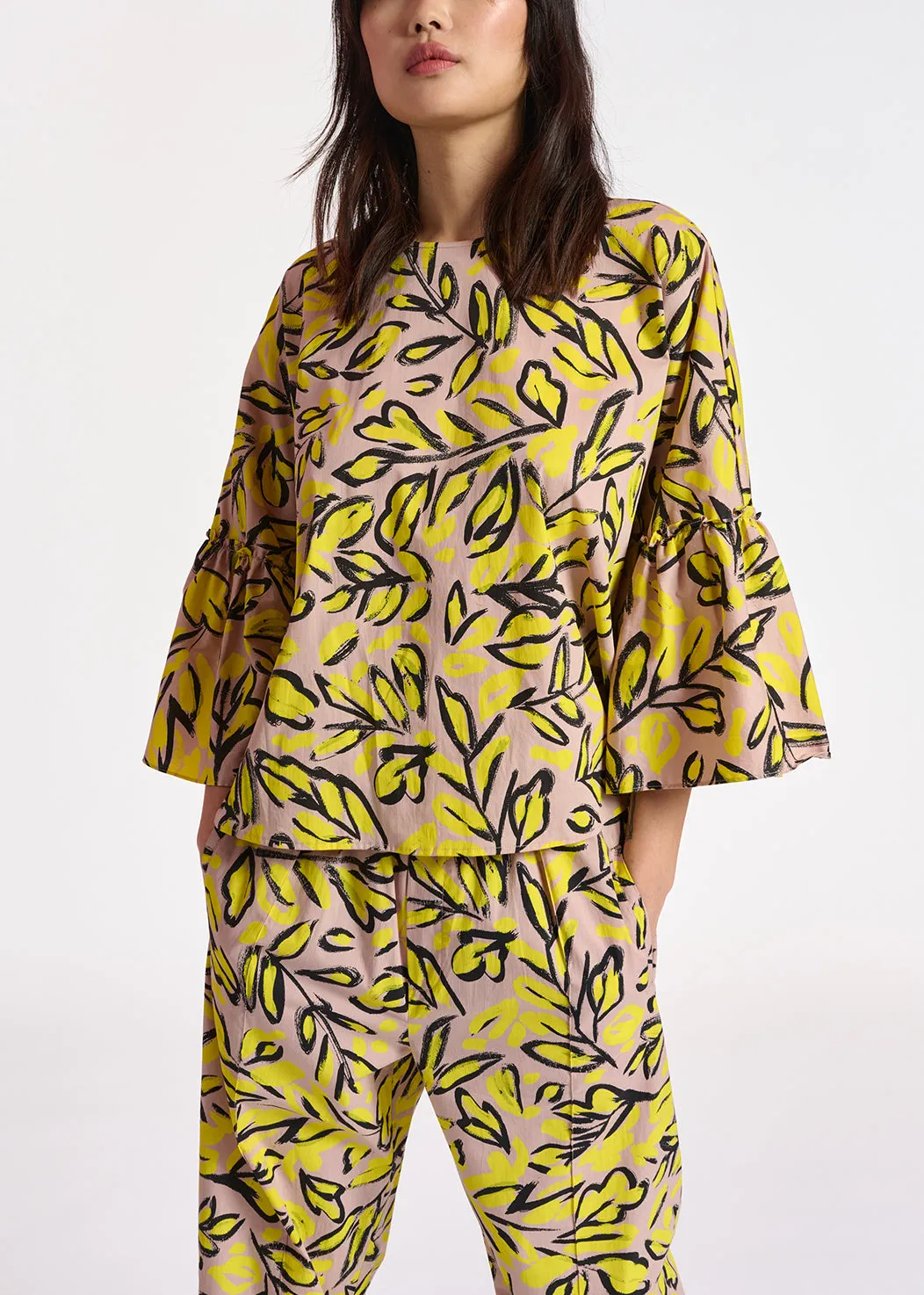 Beige floral printed top with ruffled sleeves