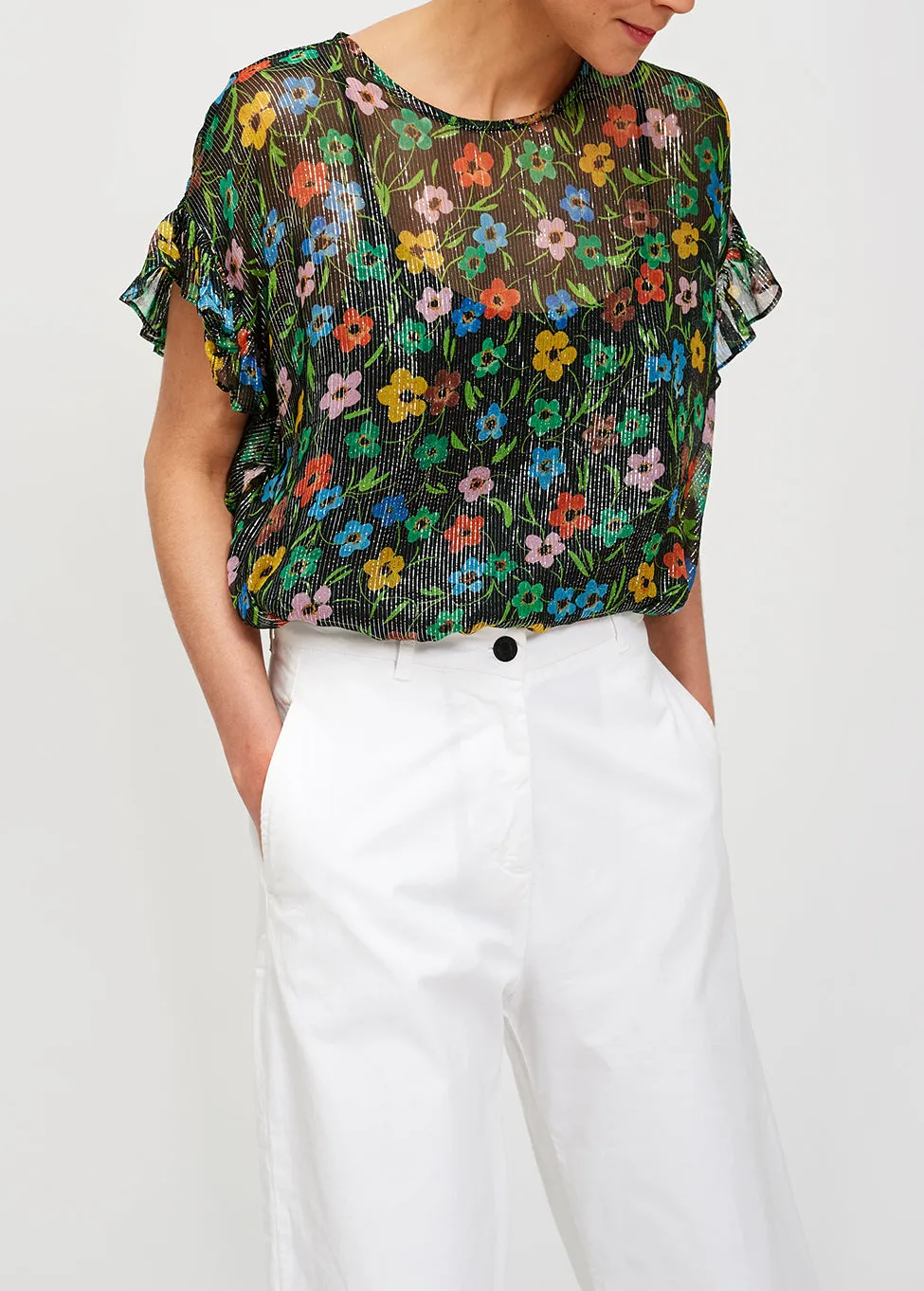 Black floral print top with ruffled sleeves