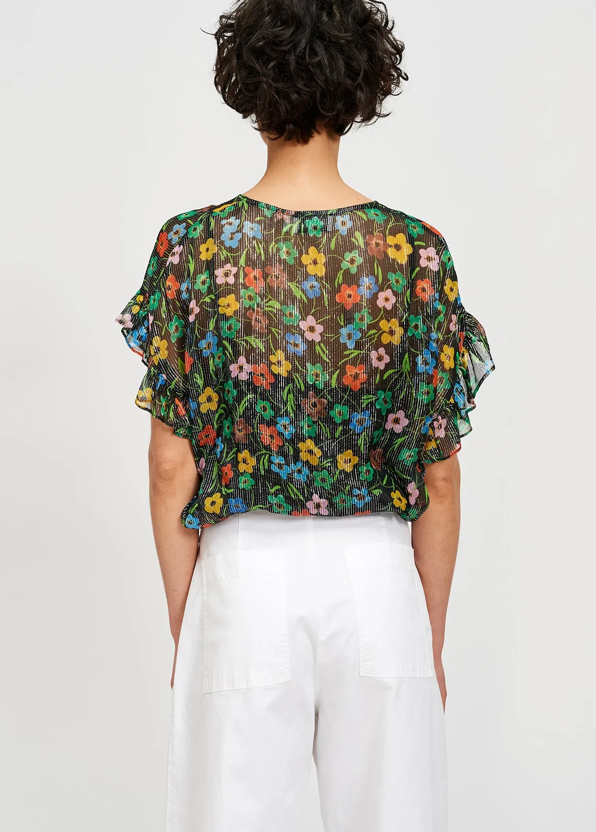 Black floral print top with ruffled sleeves