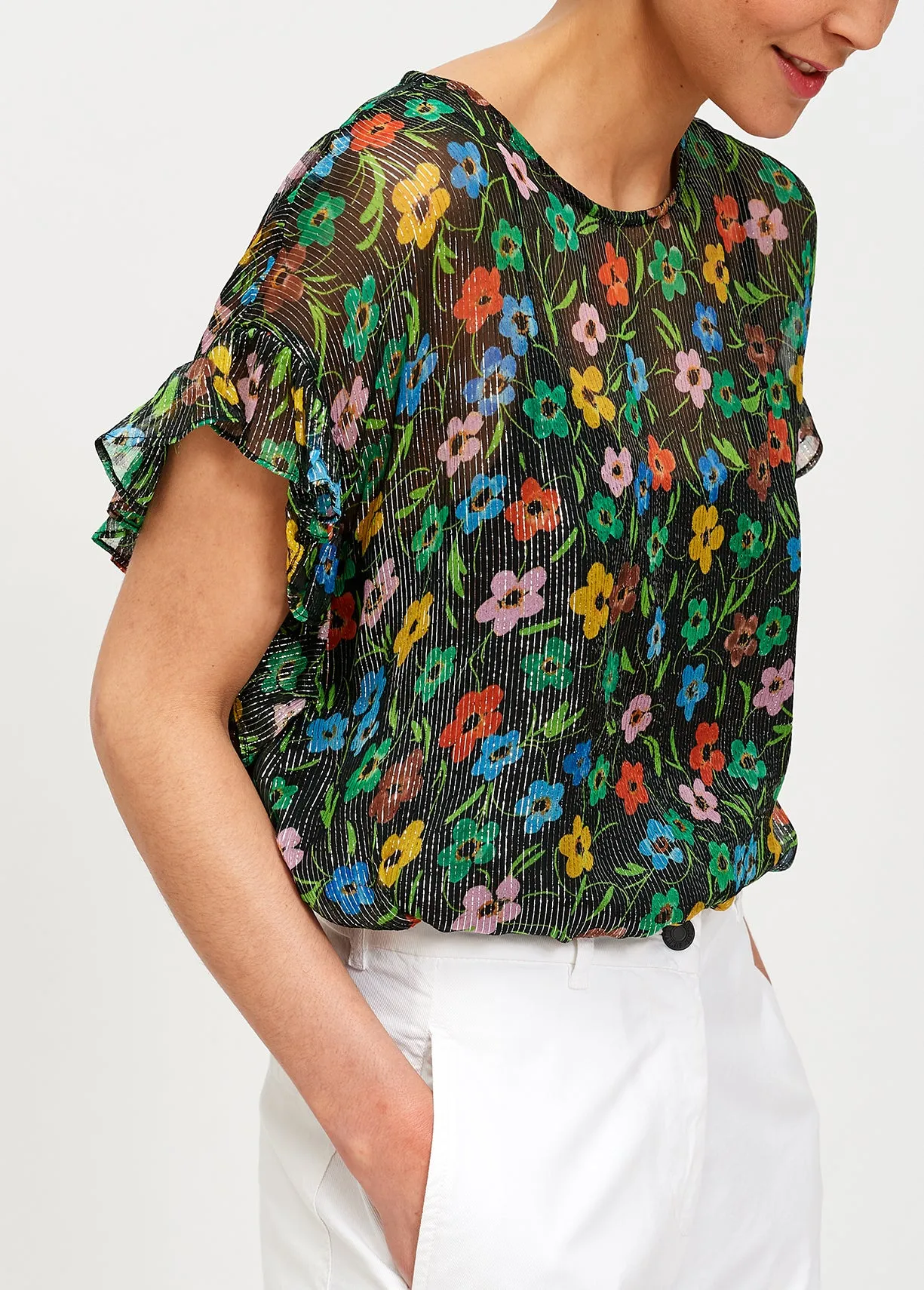 Black floral print top with ruffled sleeves