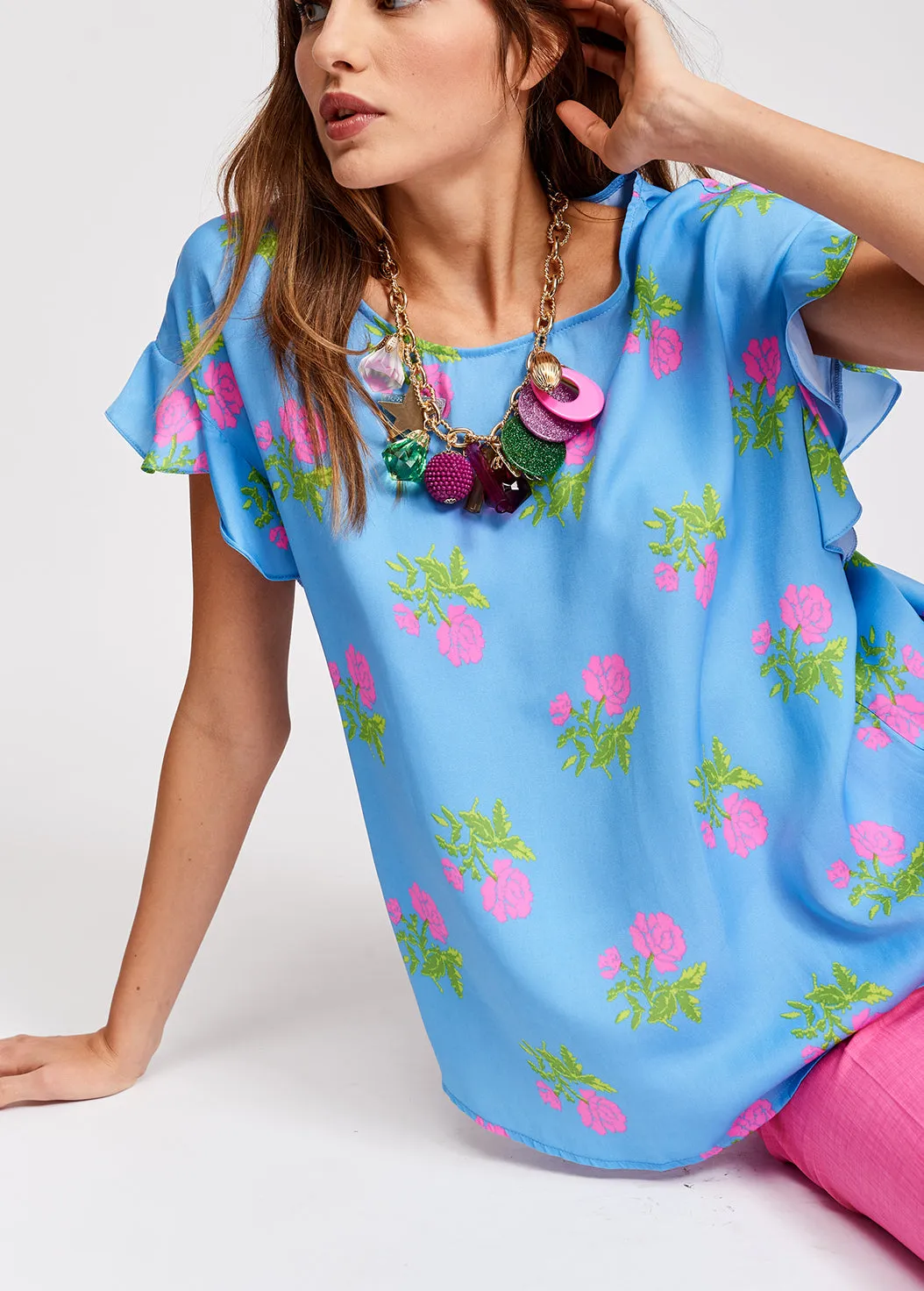 Blue flower print top with ruffled sleeves