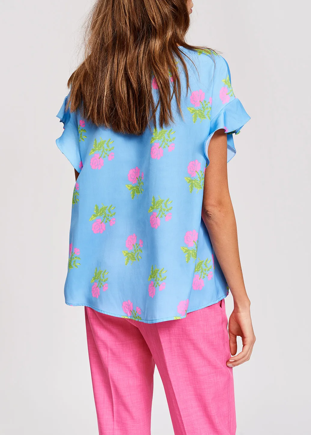 Blue flower print top with ruffled sleeves
