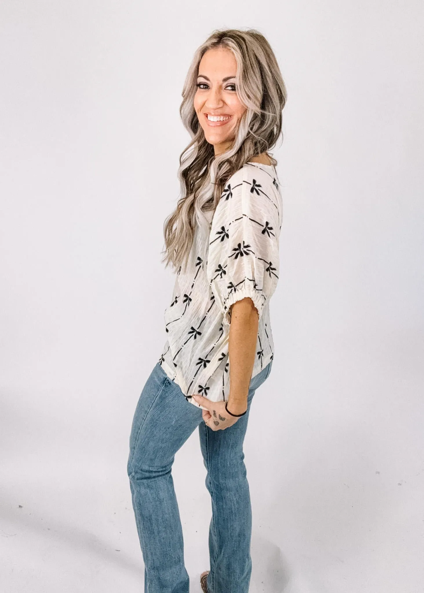 Cream and Black Bow Short Sleeve Top