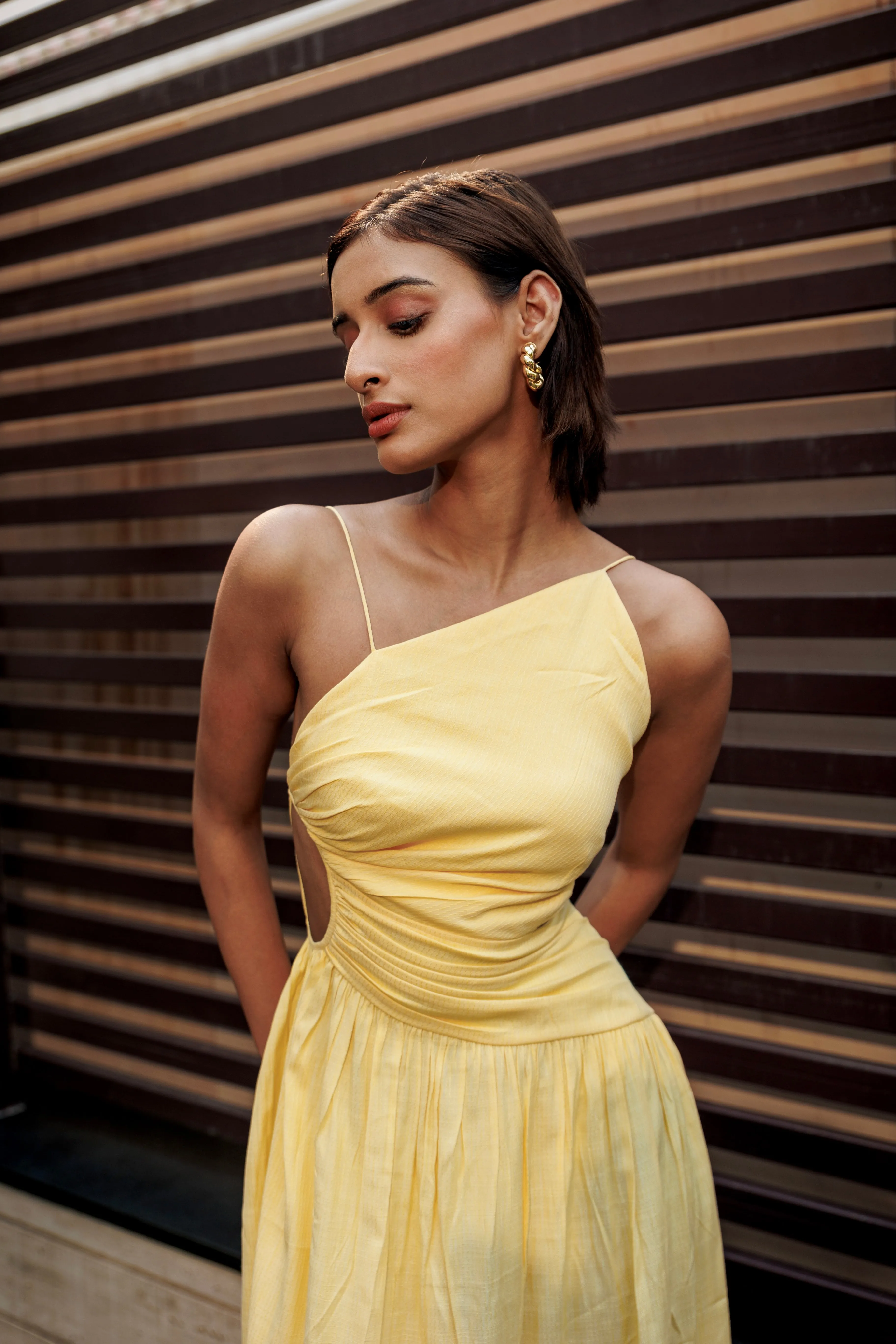 New money - yellow backless maxi dress