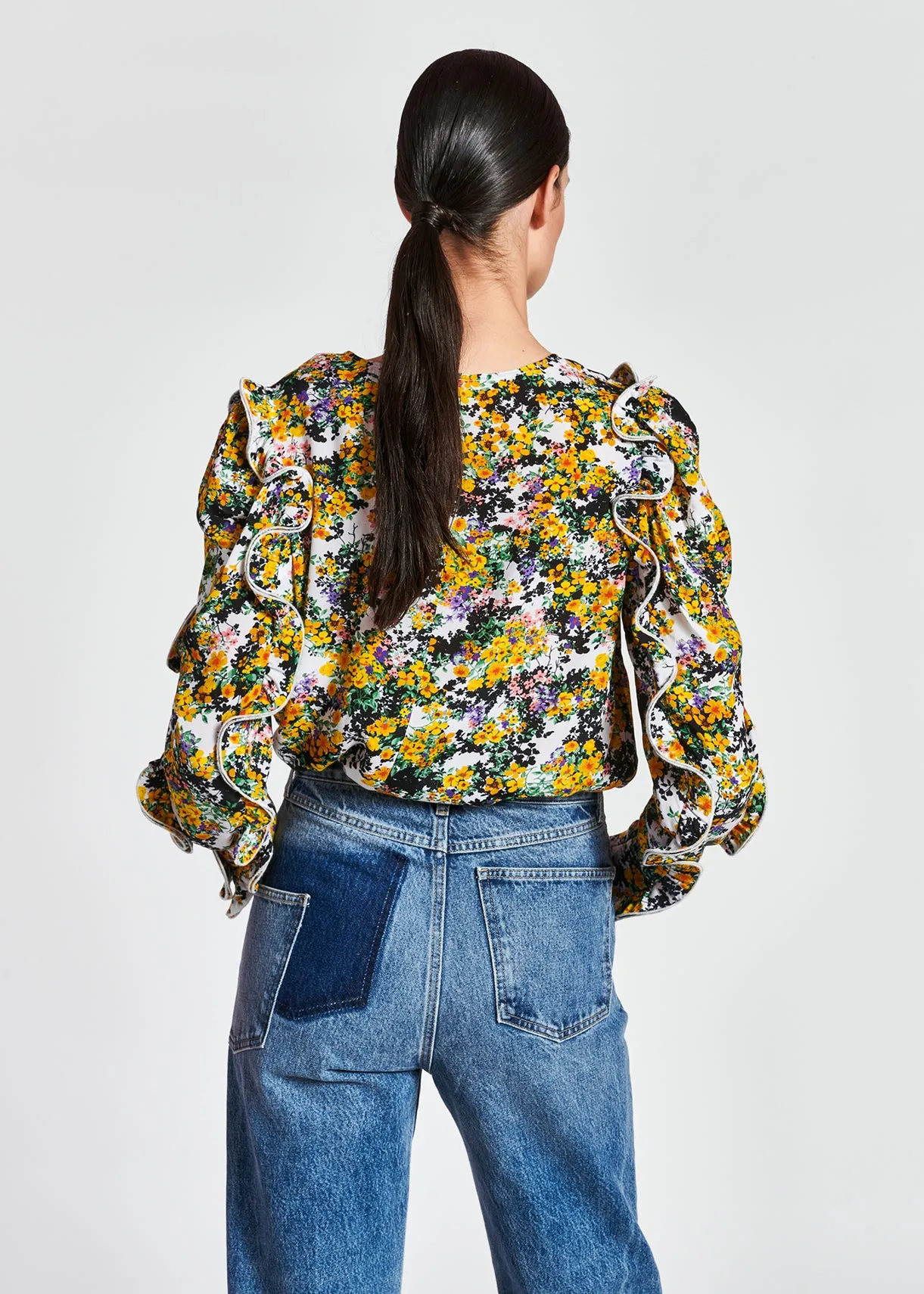 Off-white ruffled floral-print top
