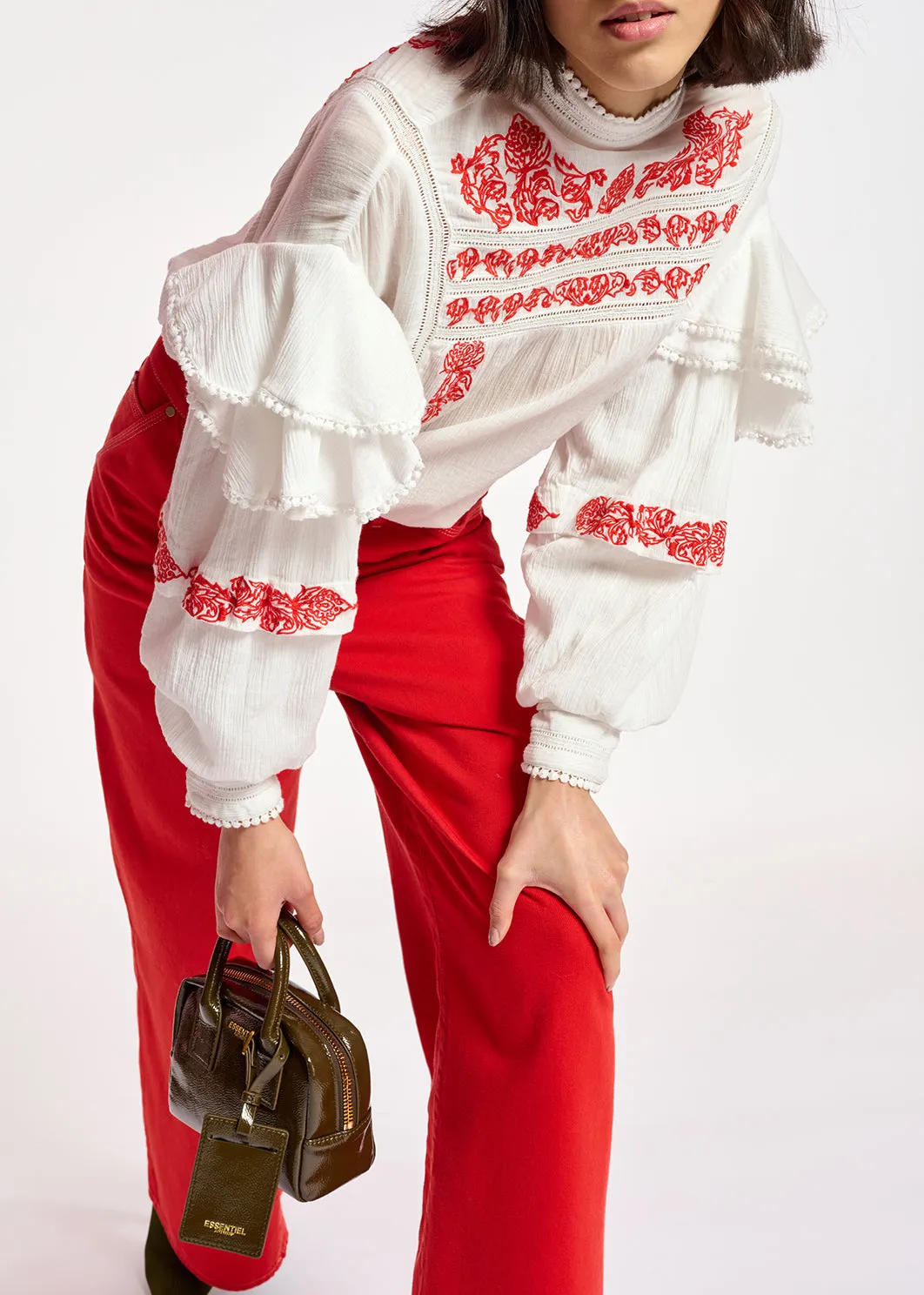 Off-white ruffled lace-trimmed top
