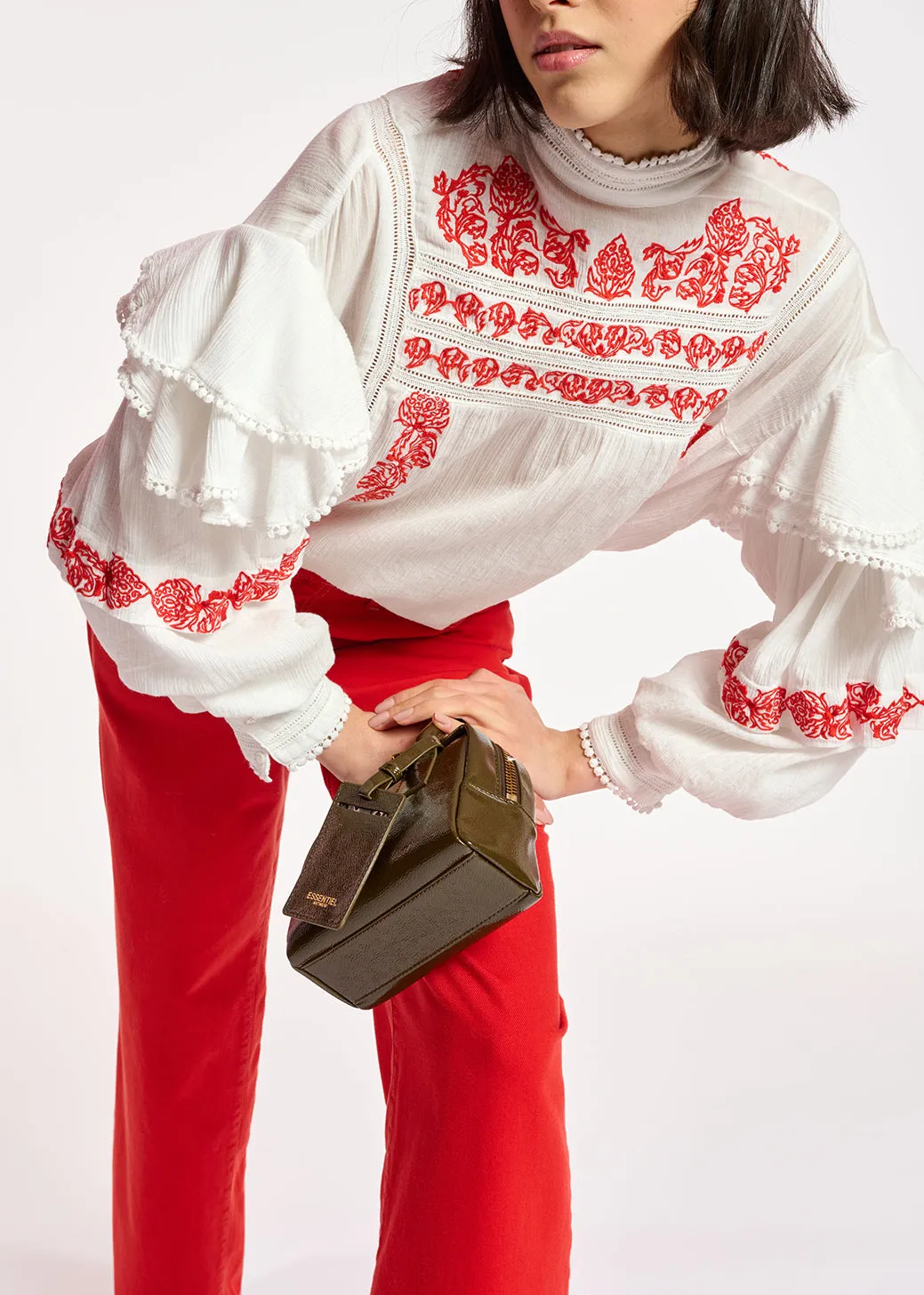 Off-white ruffled lace-trimmed top