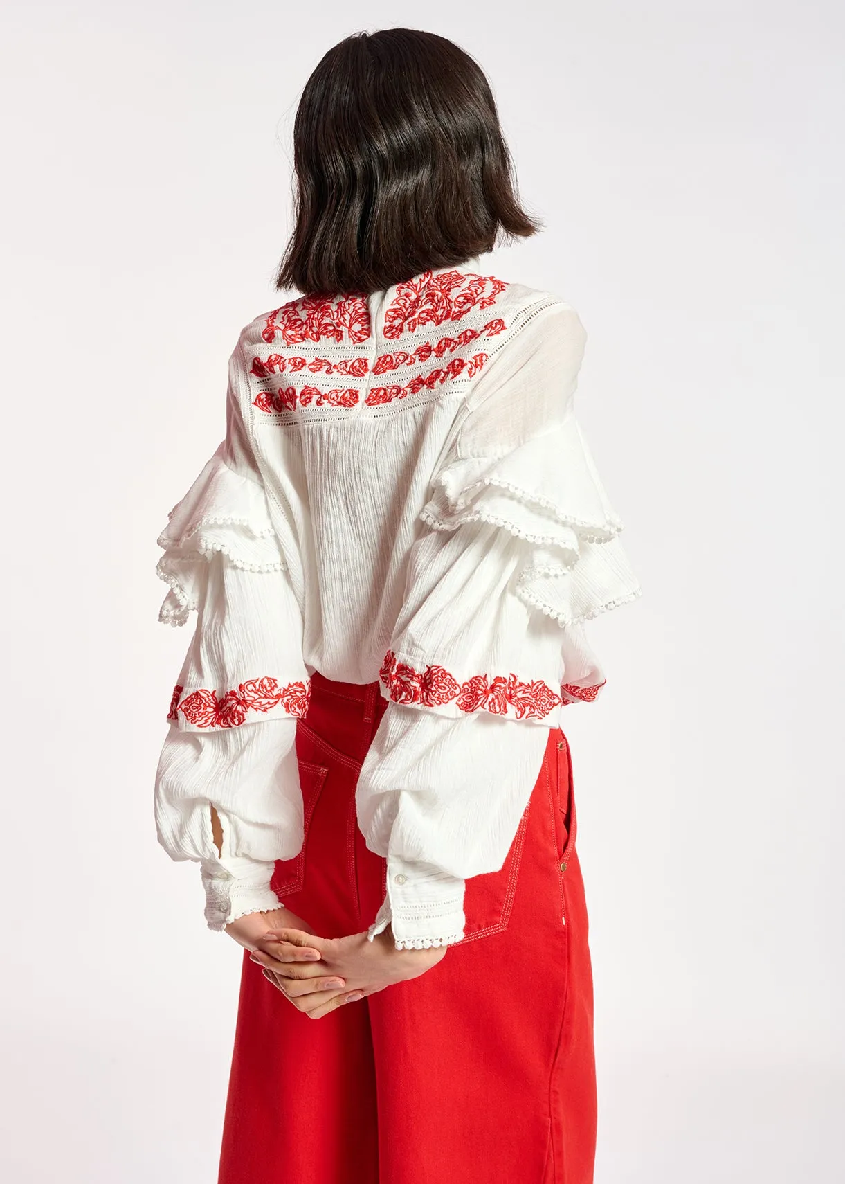 Off-white ruffled lace-trimmed top