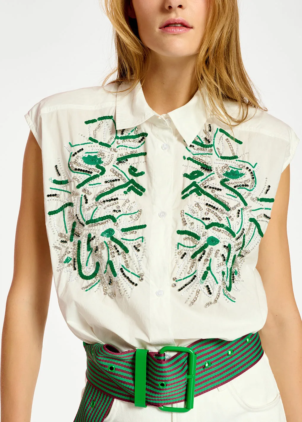White sequin and rhinestone-embellished sleeveless shirt